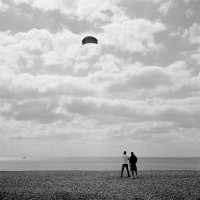 2 lads flying a kite