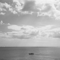 A group of people in a dinghy